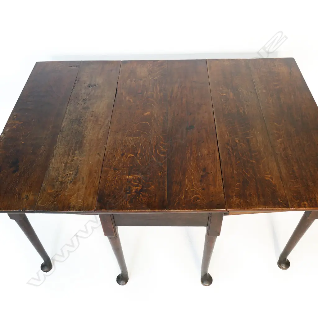 A George III oak drop leaf table, Image 1++