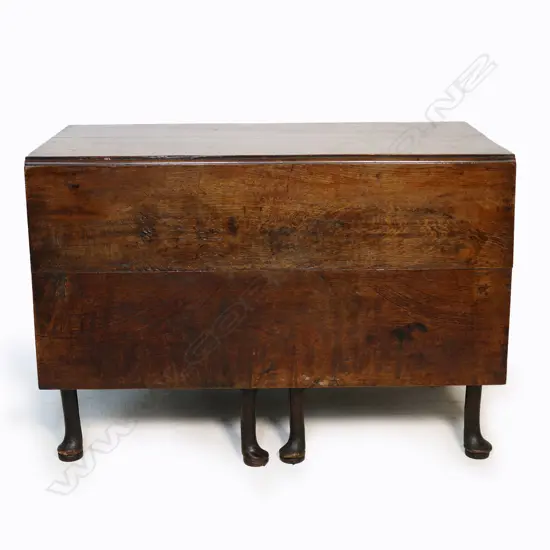 A George III oak drop leaf table,