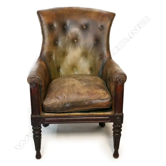 A Victorian leather high back chair,