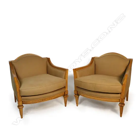 A pair of American oak armchairs,