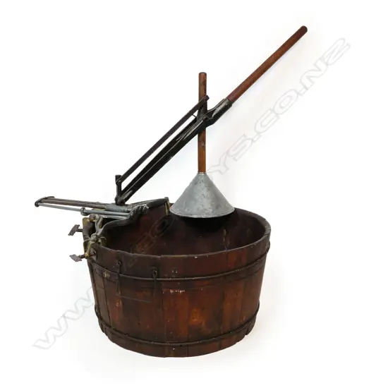 An 1883 coopered wooden washing plunger tub,