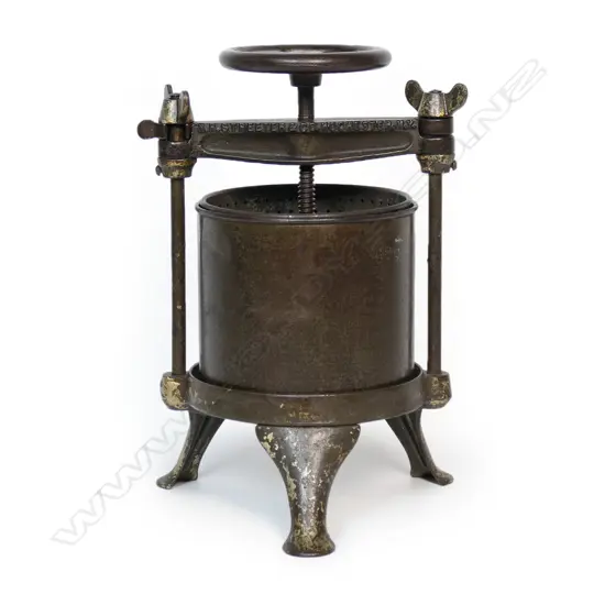 N.R. Streeter & Co. 19thC cast iron and tin (Sensible) fruit press,