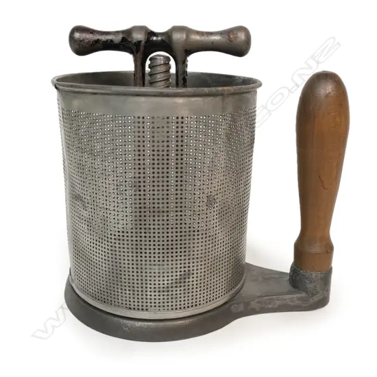 An 1873 cast iron press,