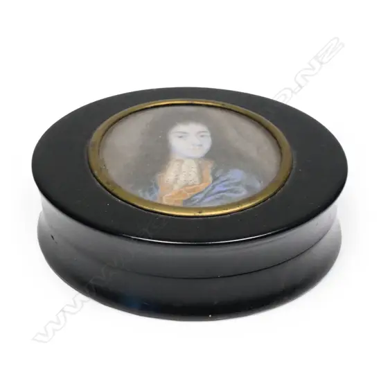 A 19thC portrait miniature lidded circular ebony snuff box,