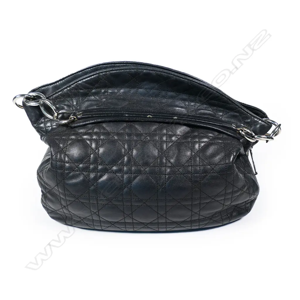 A vintage Christian Dior black quilted leather medium Hobo bag, Image 1++