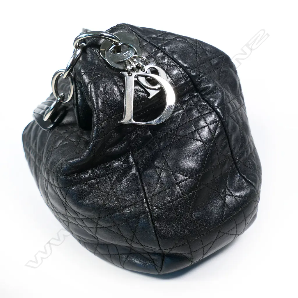 A vintage Christian Dior black quilted leather medium Hobo bag, Image 1++