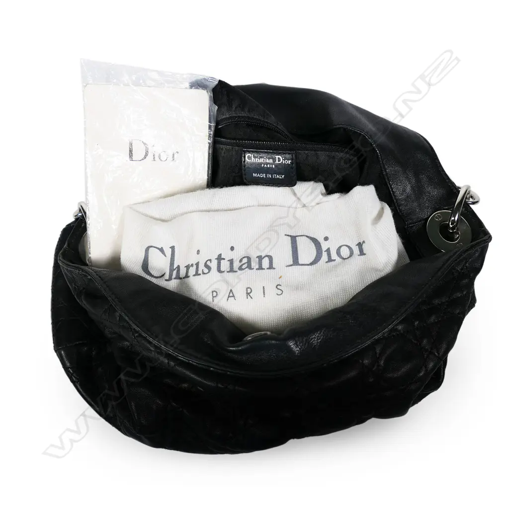 A vintage Christian Dior black quilted leather medium Hobo bag, Image 1++