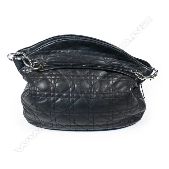 A vintage Christian Dior black quilted leather medium Hobo bag,