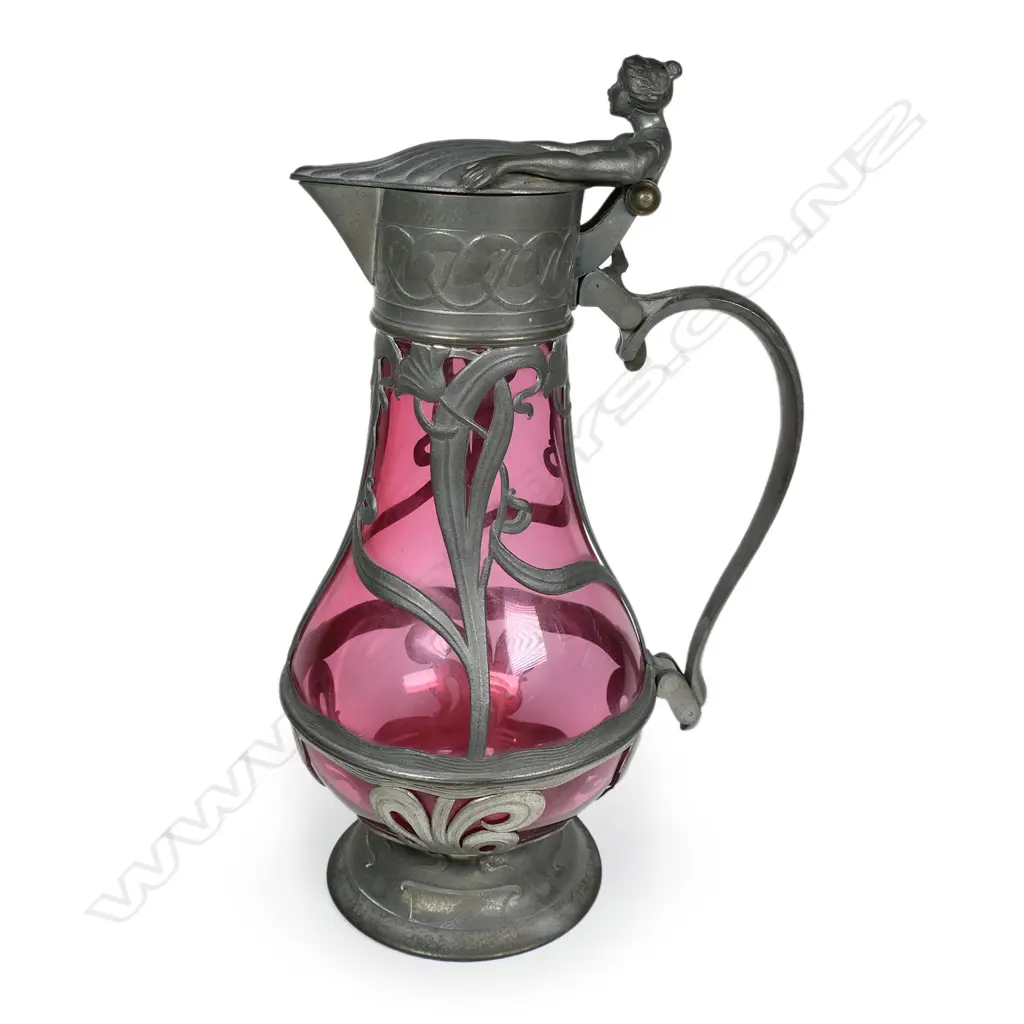 A European Art Nouveau pewter and cranberry glass wine carafe, Image 1++