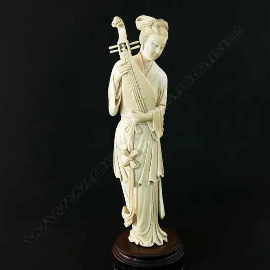 A Chinese ivory figurine,