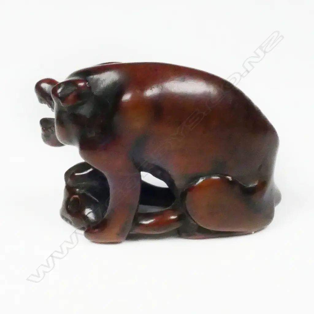 An old carved wood netsuke of a starving wolf, Image 1++