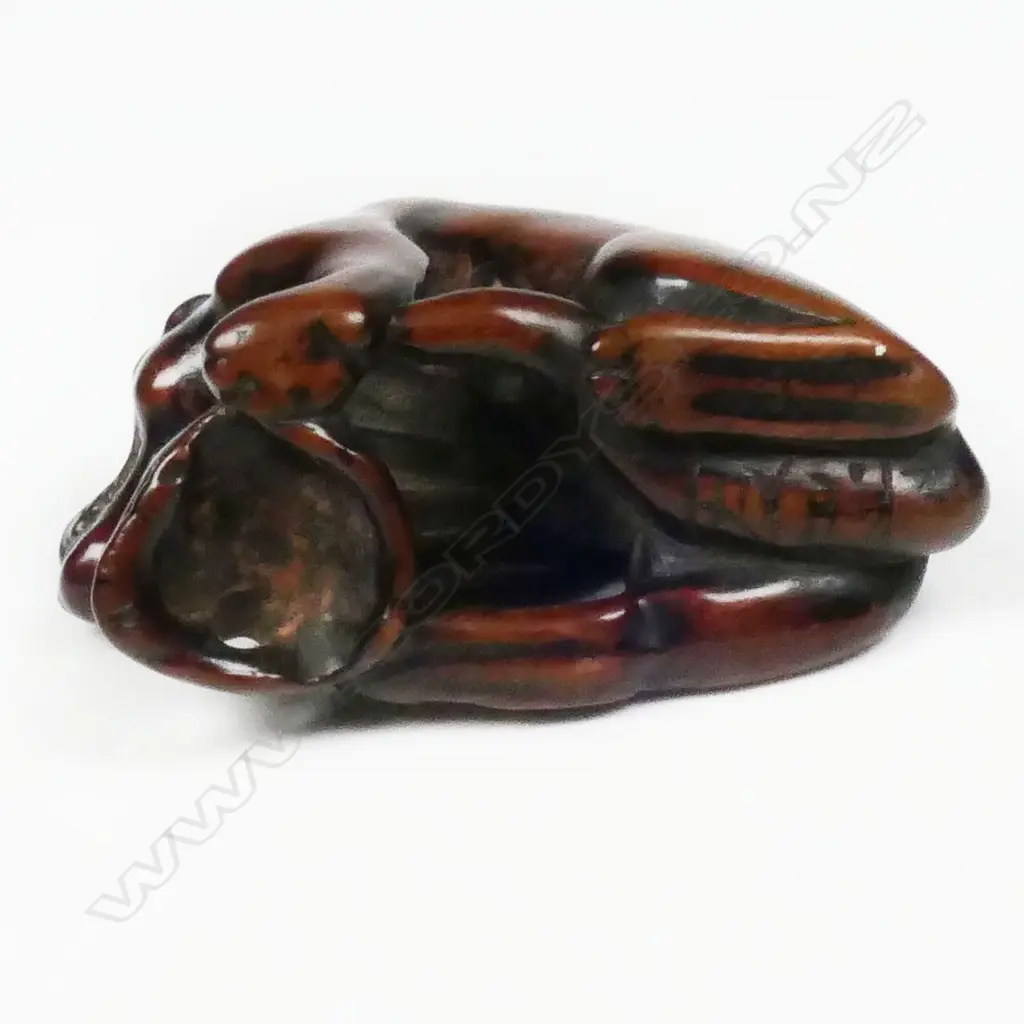 An old carved wood netsuke of a starving wolf, Image 1++