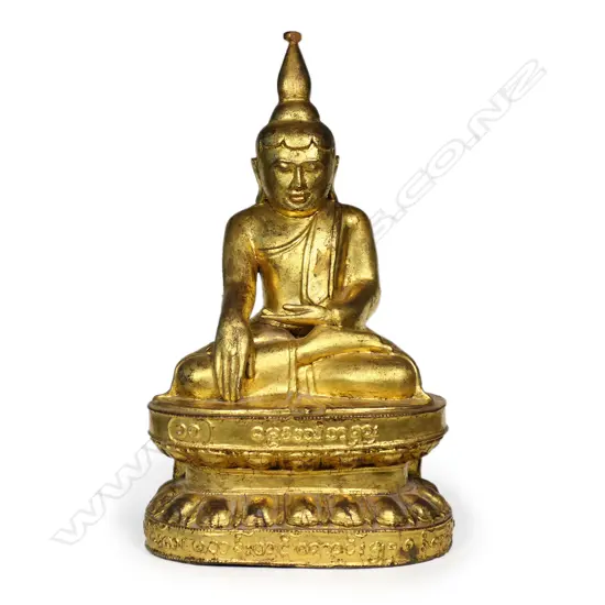 An old carved and gilded Burmese buddha,