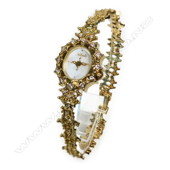 A vintage Nebula 18ct yellow gold and diamond wristwatch,