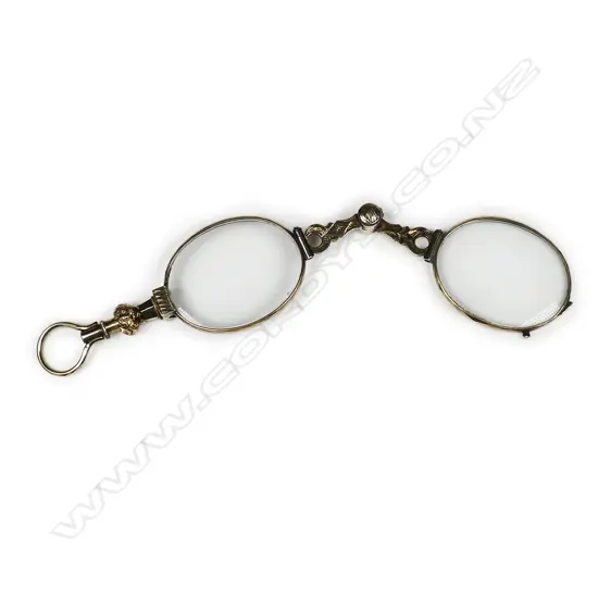 A 19thC 15ct. yellow gold folding lorgnette,