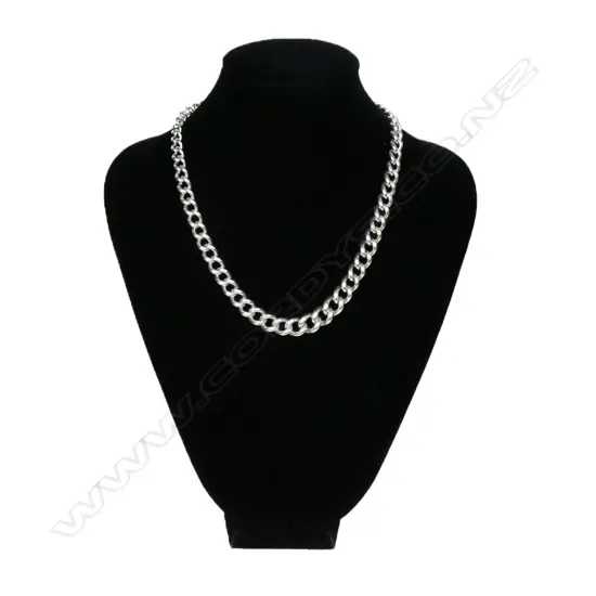 An Edwardian silver Albert chain,