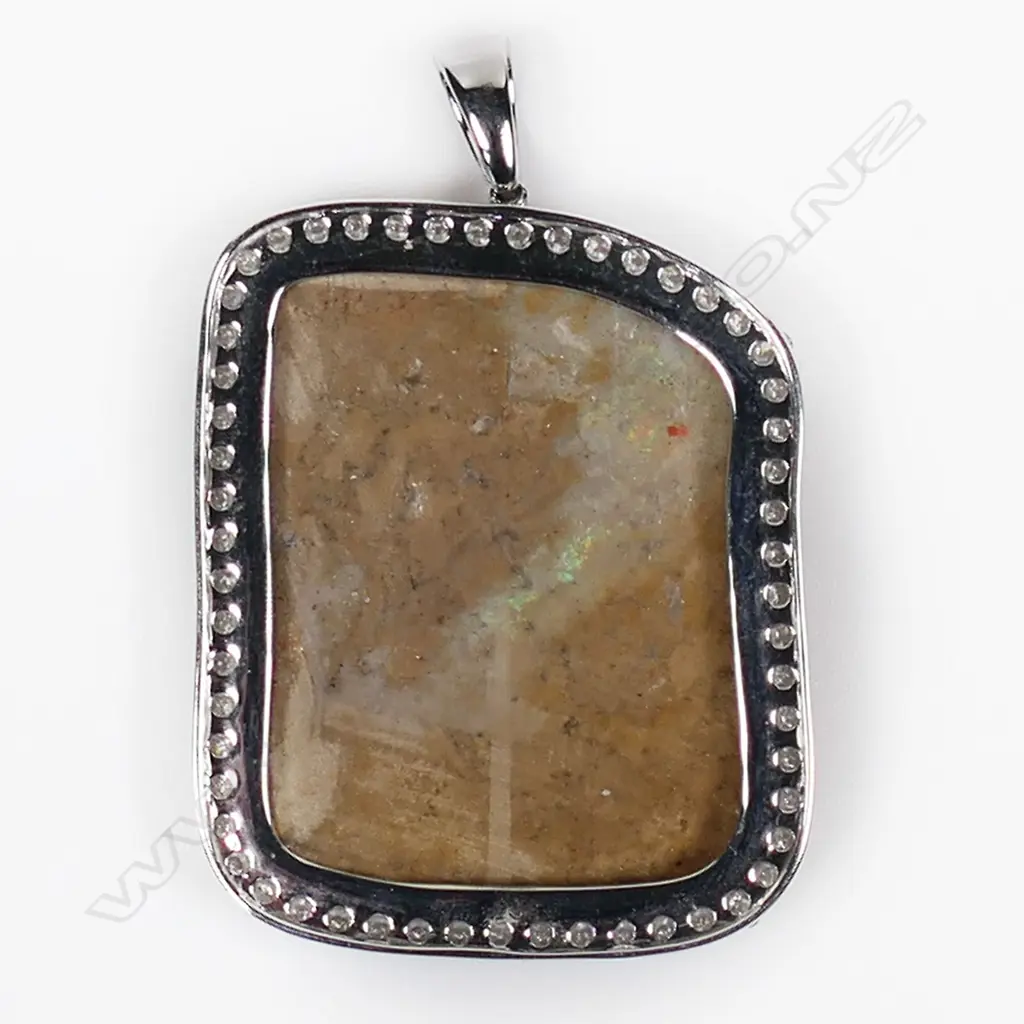 A 14ct white gold opal and diamond statement pendant, Image 1++