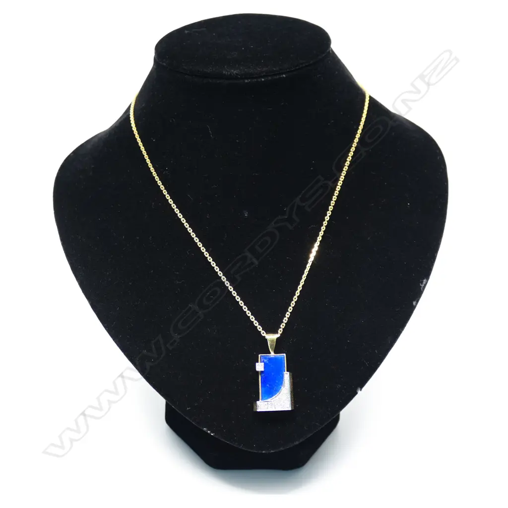 A 14ct yellow and white gold framed lapis lazuli and diamond pendant on chain, Image 1++
