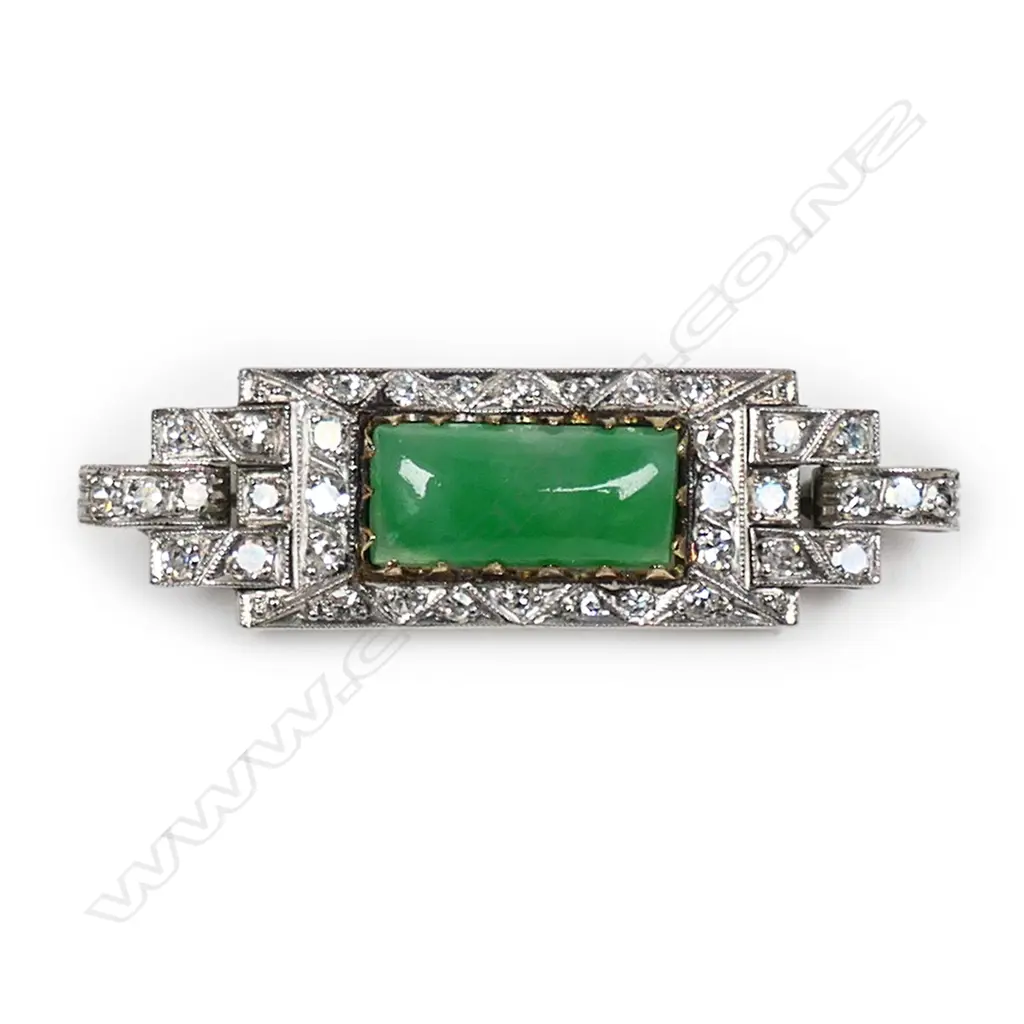 An 18ct. white gold, diamond and jade Art Deco brooch, Image 1++