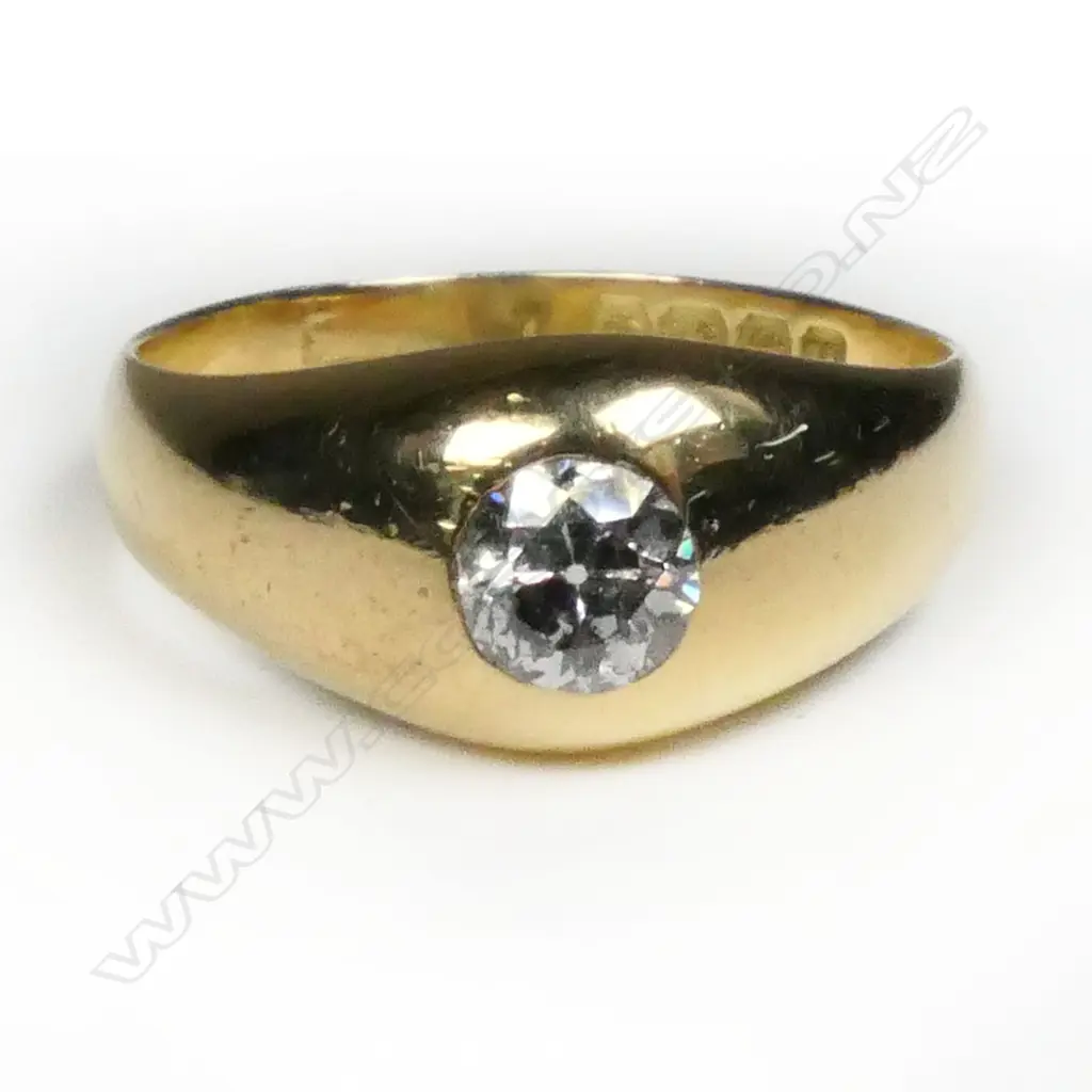 An 18ct gold and diamond solitaire ring, Image 1++