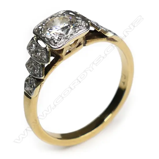 An estate 18ct gold, platinum and diamond ring,