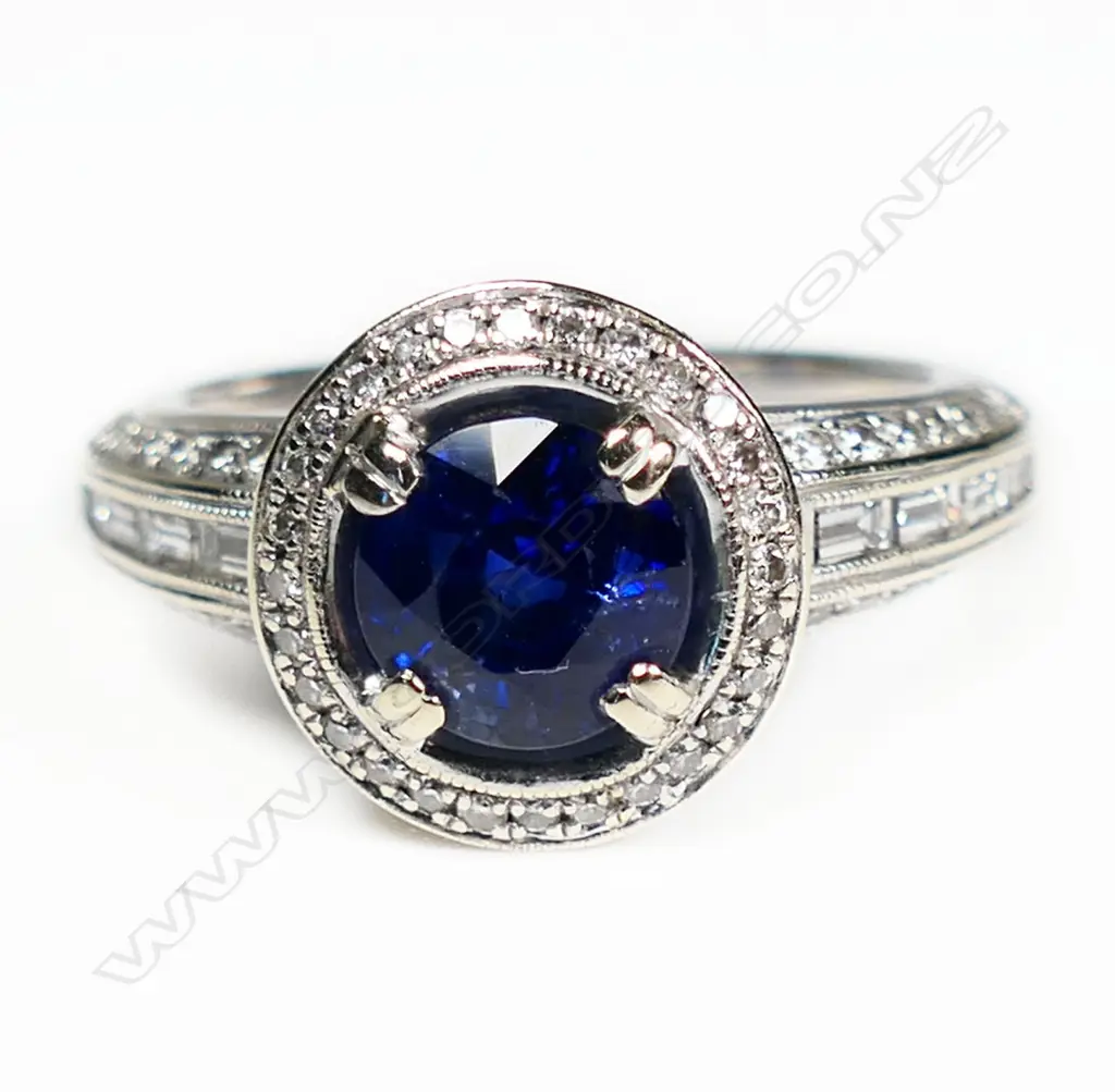An 18ct white gold diamond and sapphire ring, Image 1++