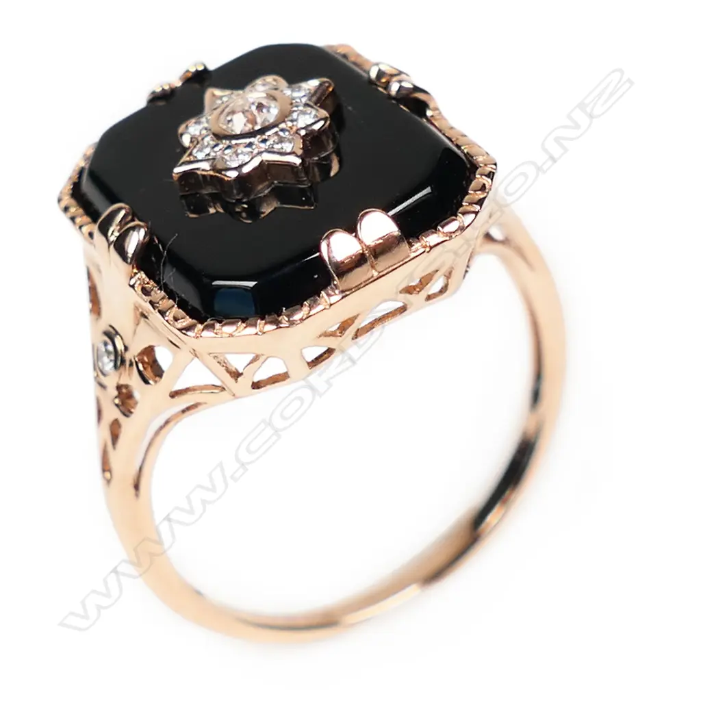 A 14ct rose gold onyx and diamond Art Deco style ring, Image 1++