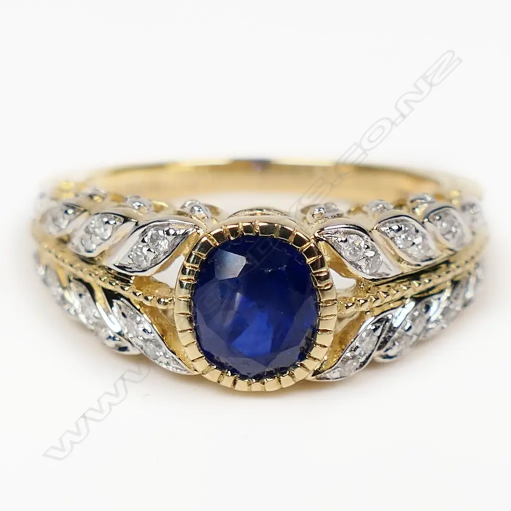 A 14ct gold sapphire and diamond dress ring, Image 1++