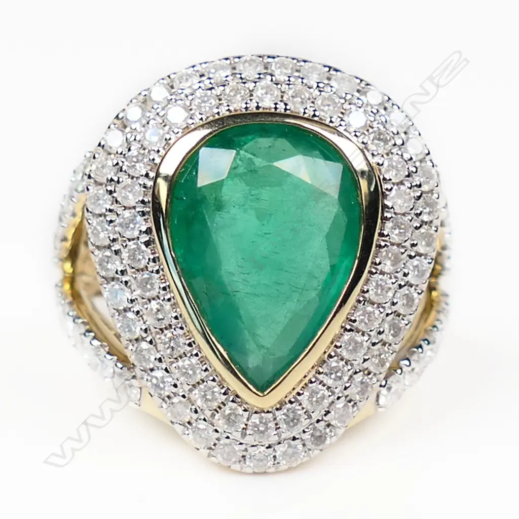A 14ct yellow and white gold emerald and diamond cocktail ring, Image 1++