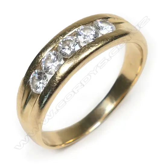 An 18ct gold and five stone diamond ring,