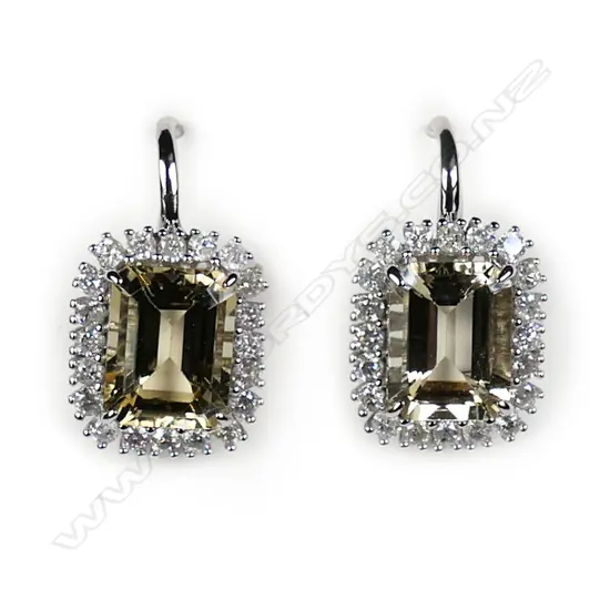 A pair of 14ct white gold heliodor and diamond halo drop earrings,
