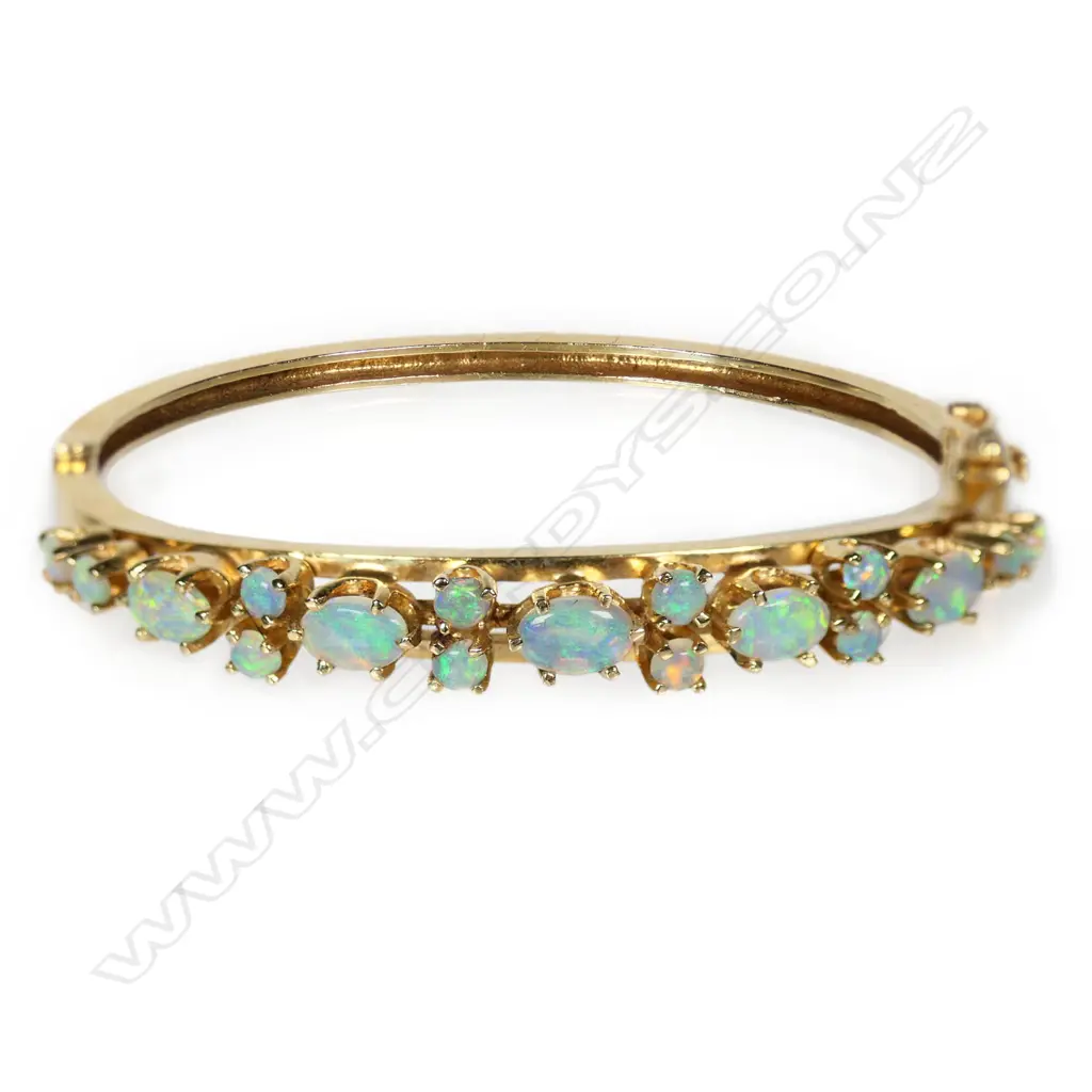 A 14ct gold and opal Edwardian style hinged bangle, Image 1++