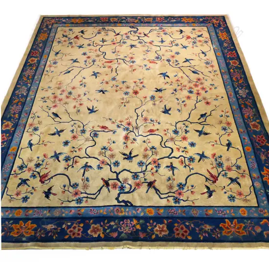 A large antique Chinese carpet,
