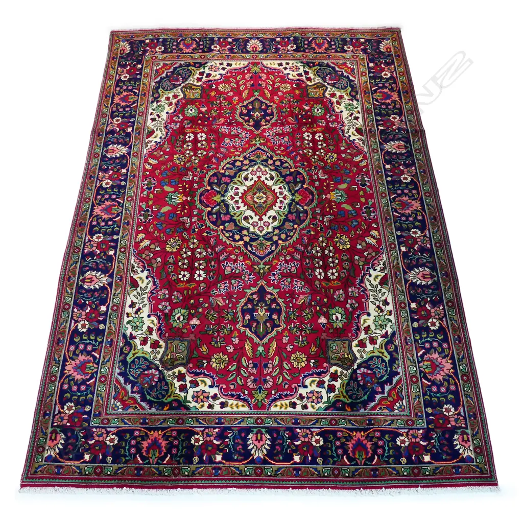 A fine Tabriz carpet, Image 1++