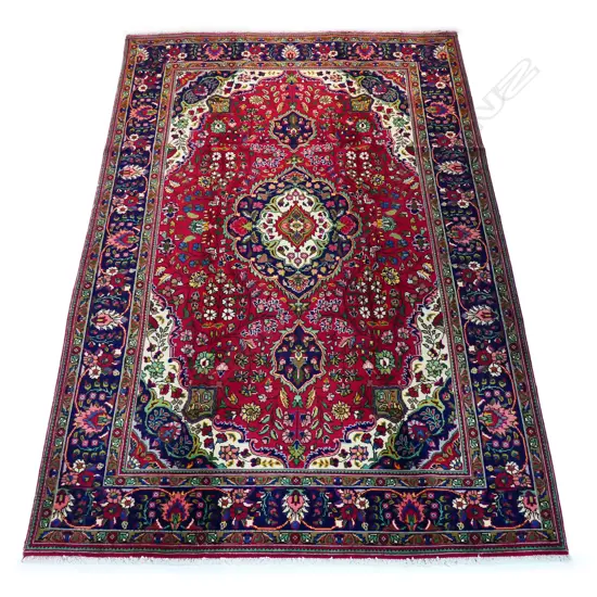 A fine Tabriz carpet,