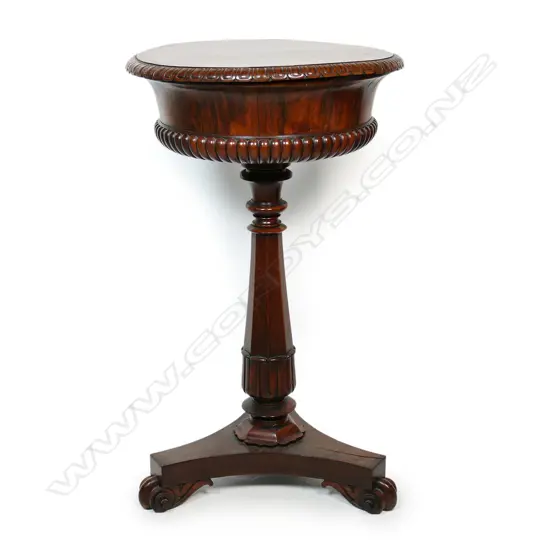 A rare telescopic lidded William IV rosewood circular teapoy,