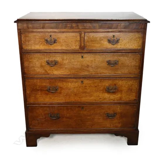 A Georgian oak five drawer flat front chest,
