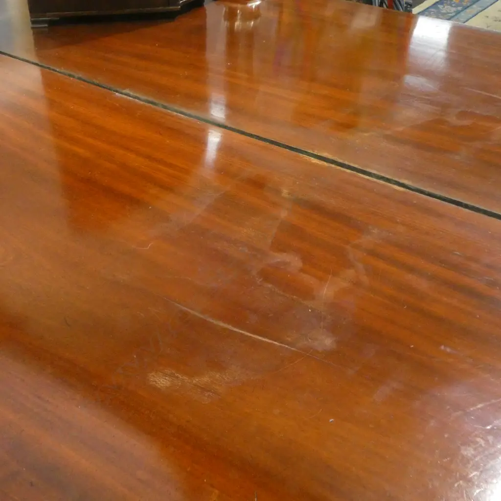 A quality Victorian mahogany mirror back sideboard - carved detail to the mirror back, the base with three drawers over a central cupboard, the side doors open to reveal shelves with one side containing a cellarette, raised on plinth base. 1820 x 580 x 1800mm. Some heat and/or water damage to the top. Image 1++