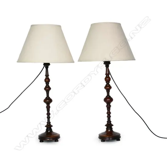 A pair of turned wood table lamps,