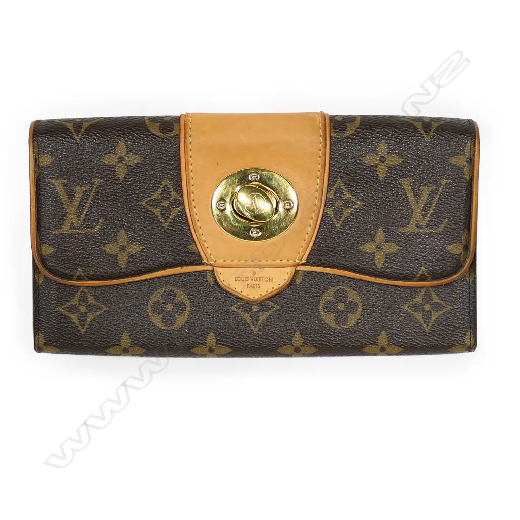 A Louis Vuitton Portfolio-Boesi folded purse, Image 1++