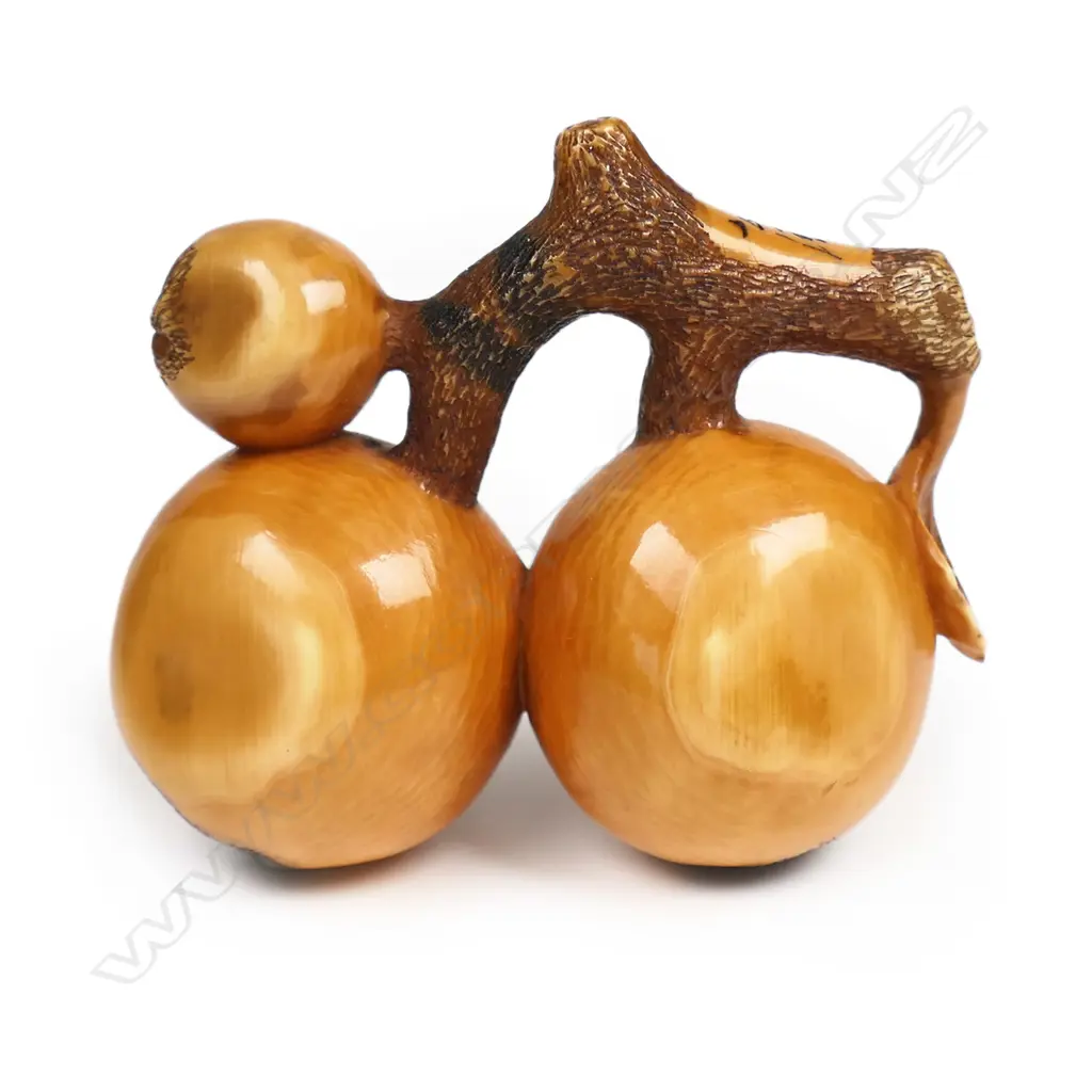 A 19thC ivory netsuke of a group of biwa fruit, Image 1++