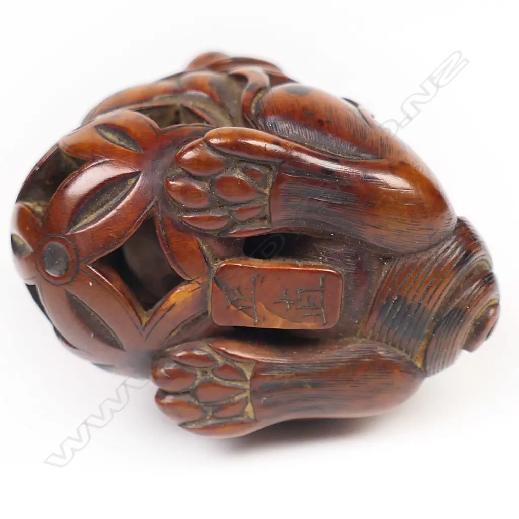An early 19thC wood netsuke study of a shishi, Image 1++