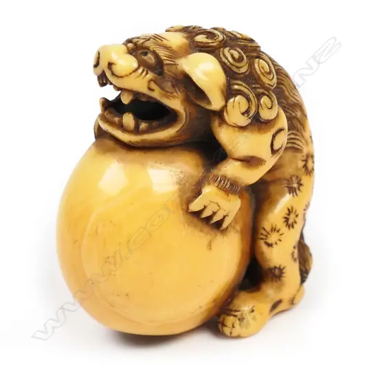 An old ivory netsuke of a shishi,