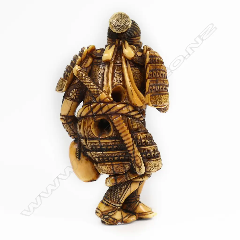 An ivory netsuke figure of a warrior, Image 1++