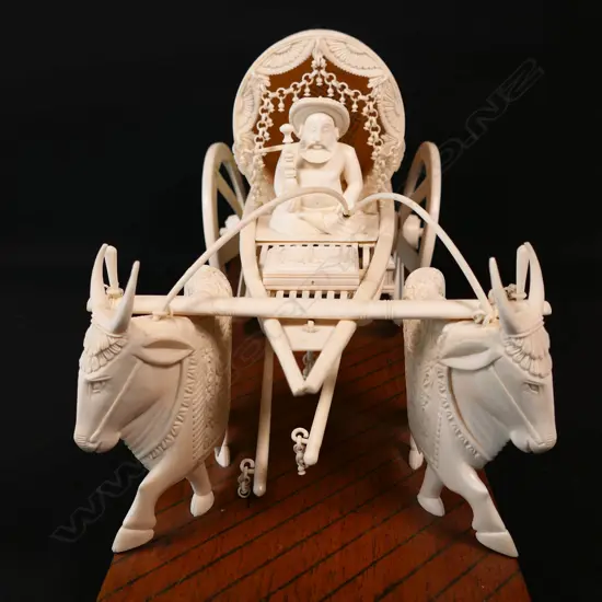 An Asian ivory bullock cart,