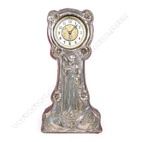 An Edwardian silver Art Nouveau embossed desk clock