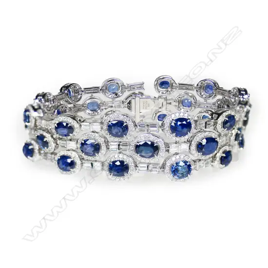 An impressive 18ct white gold sapphire and diamond triple row bracelet,