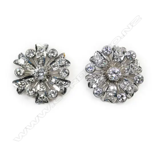 A pair of vintage precious metals and diamond cluster earrings,