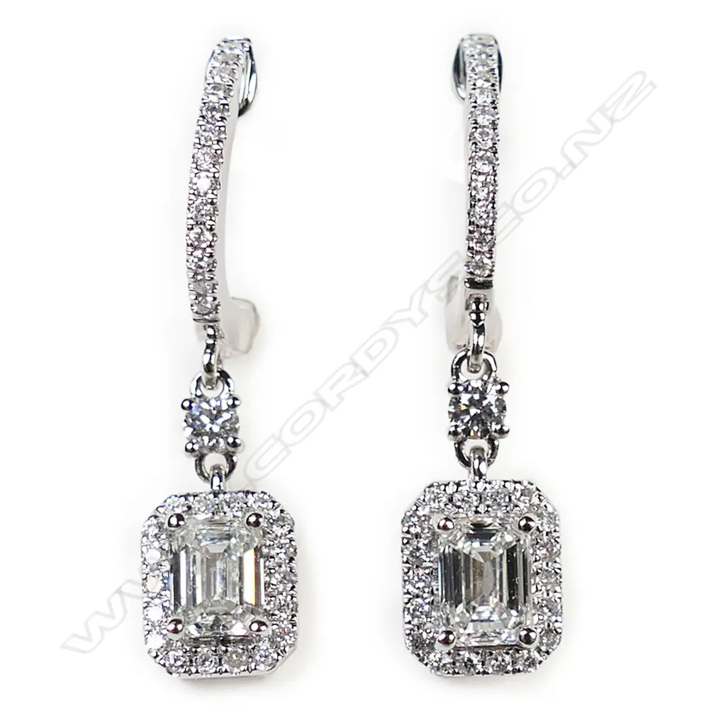 A pair of 18ct white gold and diamond earrings, Image 1++