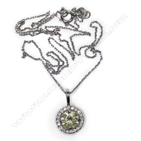 A 14ct white gold and diamond cluster pendant,